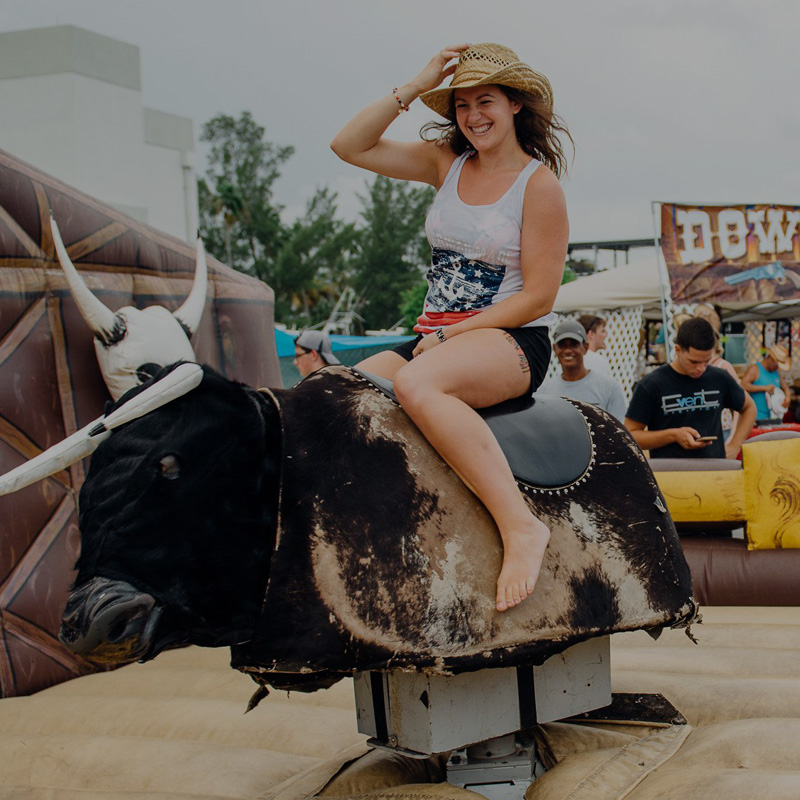 Girl Riding Mechanical Bull